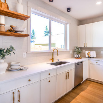 Kitchen Sink Wall with Floating Wood Shelves and Brass Faucet – Snohomish