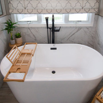 Traditional Master Bathroom With Warm Tones, Stand Alone Tub & Walk In Shower