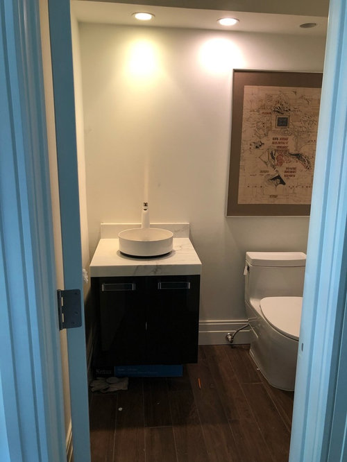 wall tile placement in powder room