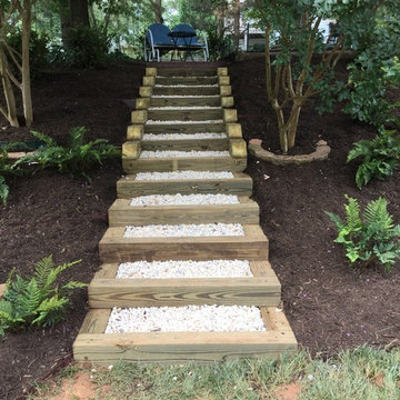 Wooden Staircase with River Rock