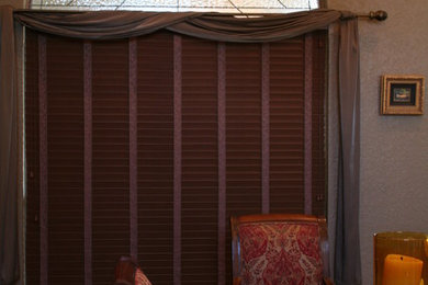 Mid-sized elegant medium tone wood floor great room photo in Austin with gray walls