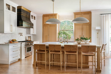 Kitchen - traditional light wood floor and white floor kitchen idea in Dallas with an undermount sink, beaded inset cabinets, light wood cabinets and white countertops