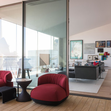 Terrace with Red Armchairs and Living Room View