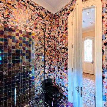 Custom Artistic Hallway Bathroom with Iridescent Tile and Bold Design