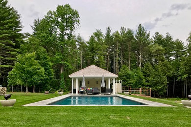 Inspiration for a mid-sized modern backyard rectangular lap pool in Boston.