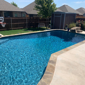 Custom Concrete Pool with Tanning Ledge, LED Lighting, Flagstone Coping