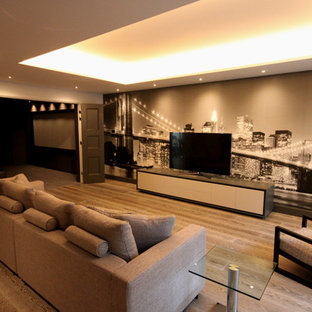 Small contemporary open plan home cinema in Wiltshire with a built-in media unit.