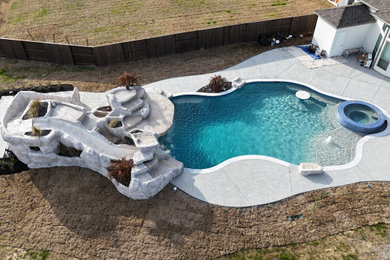 Beach style pool photo in Houston