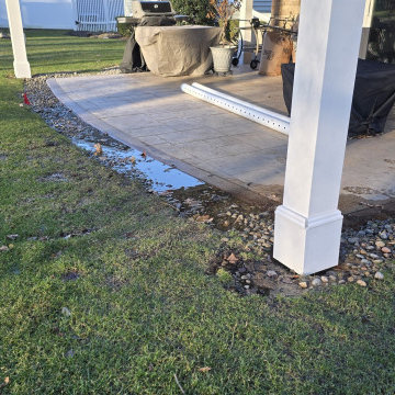 French Drain Installation with Stone and Landscaping
