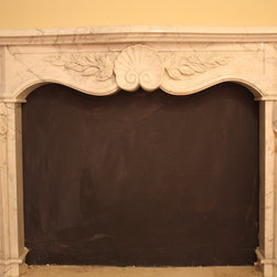 Custom Hand Carved Fireplace - Indoor Fireplaces