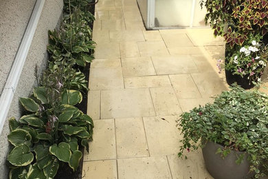 Photo of a mid-sized rustic landscaping in Other.