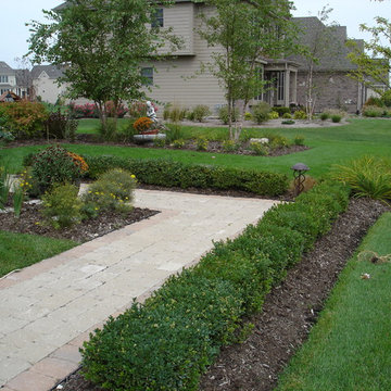 Formal paver patio gardens