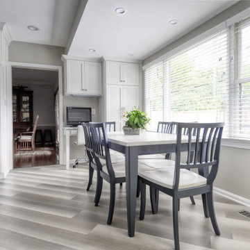 Navy Stained Island, Hood vent and Floating Shelves in White Shaker Kitchen