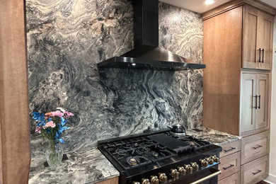 Photo of a kitchen in Richmond with marble worktops, grey splashback, marble splashback and grey worktops.