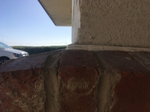 Is this how stucco is supposed to transition to brick?