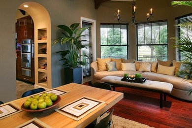 Inspiration for a mid-sized formal and open concept medium tone wood floor living room remodel in Tampa with beige walls, no fireplace and no tv
