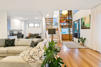 Photo of a beach style open concept living room in Sunshine Coast.