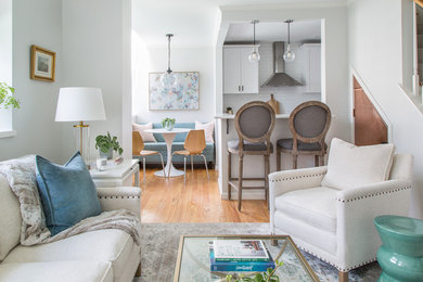 Example of a small transitional open concept and formal light wood floor and beige floor living room design in Boston with gray walls, no fireplace and no tv