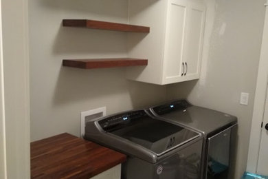 Laundry Room with cabinet, cubbies and floating shelves