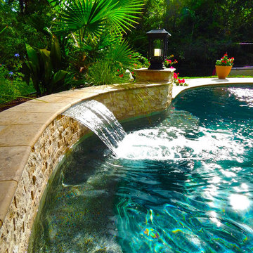 Curved Pool with Fountain and Pergola