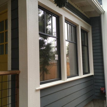 UPVC European triple pane windows with colored exterior film, proper casework wi