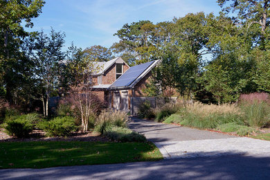 Example of a mid-sized country home design design in New York