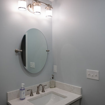 Finished Basement with Seated Bar, Gym and Bathroom in White Lake, MI