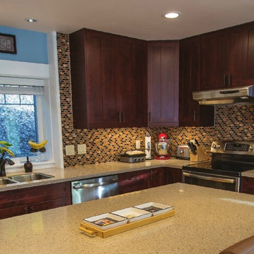 Merlot Cabinets & Solid Surface Countertops