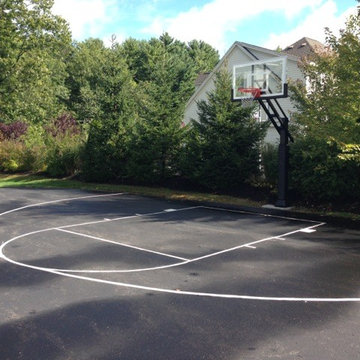 Daniel R's Pro Dunk Gold Basketball System on a 50x45 in Bedford, NH