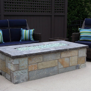 Natural Gas Fire Pit with stone sides and coping