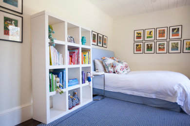 Design ideas for a contemporary kids' bedroom for kids 4-10 years old and girls in San Diego with beige walls.