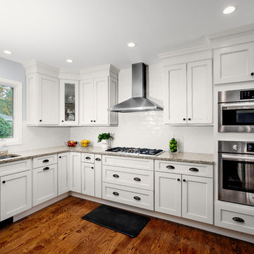 A modern Fusion Blanc kitchen with a built in coffee station