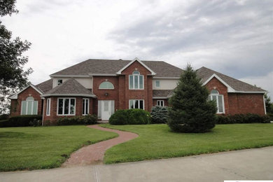 Inspiration for a timeless exterior home remodel in Omaha