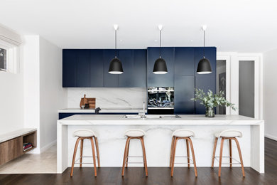 This is an example of a contemporary kitchen in Sydney.