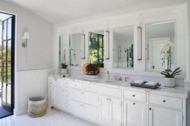 Inspiration for a large timeless master bathroom remodel in Los Angeles with shaker cabinets and a built-in vanity