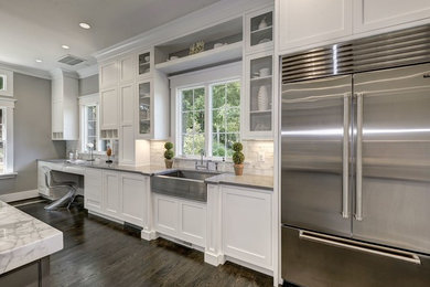 Inspiration for a huge contemporary l-shaped dark wood floor and brown floor open concept kitchen remodel in DC Metro with a farmhouse sink, shaker cabinets, white cabinets, quartz countertops, multicolored backsplash, marble backsplash, stainless steel appliances, an island and gray countertops