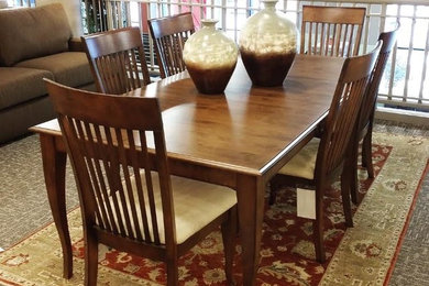Transitional Dining with a traditional rug - customize your finish, table leg, a
