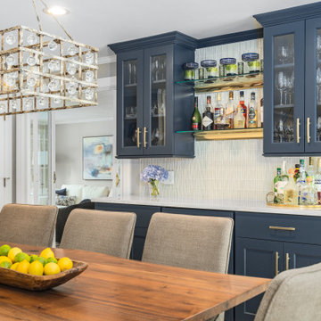 Elegant White and Navy Kitchen with Bar