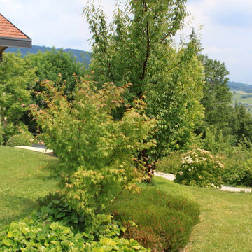 UN JARDIN EN COURBES ROUILLEES / 950 m2 / HAUTE-SAVOIE (74)