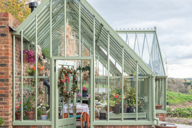Design ideas for a large victorian attached greenhouse in Other.