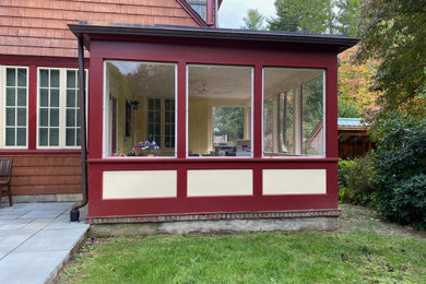 Inspiration for a mid-century modern home design remodel in Boston