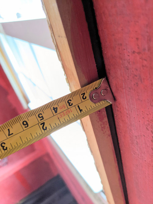 Shallow Wooden Window Frame in Shower