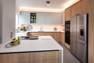 This is an example of a contemporary kitchen in Kent.