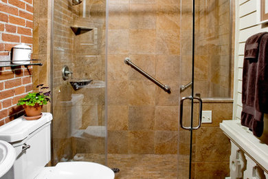 Mid-sized traditional bathroom in Philadelphia with an alcove shower, a one-piece toilet, brown tile and brown walls.
