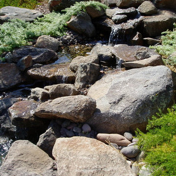 Water feature, boulders, functioning creek and waterfalls