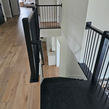 Project #130 | Curved Staircase with Wraparound Balcony