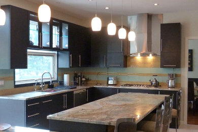Eat-in kitchen - large contemporary l-shaped ceramic tile eat-in kitchen idea in DC Metro with an undermount sink, dark wood cabinets, marble countertops, glass tile backsplash, stainless steel appliances and an island