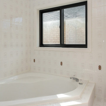 New Black Window in Gorgeous Bathroom - Renewal by Andersen Greater Toronto and 