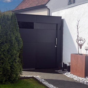 Modernes Gartenhaus als Fahrradgarage