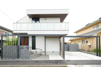 This is an example of a white modern detached house in Yokohama.